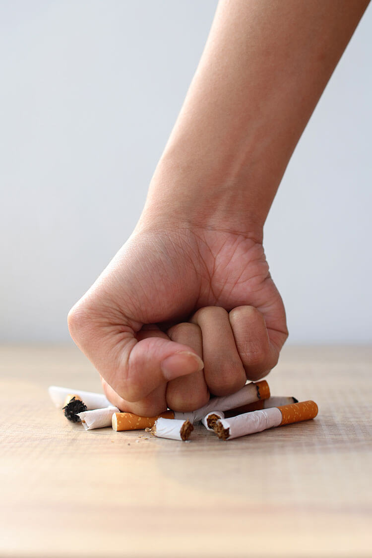 fist smashing broken cigarettes tobacco stop smoking
